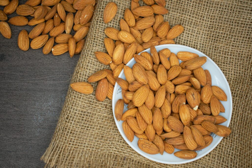 Are Almonds Good for Diabetes? A Closer Look brown almond nuts on white plate
